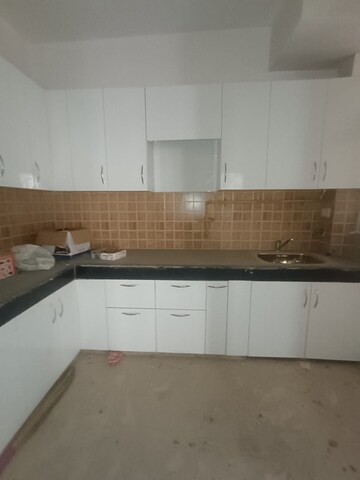 Kitchen in 2.5 BHK Apartment at Mahagun Mywoods, Sector 16c Greater Noida – for Sale