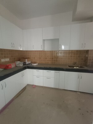 Kitchen in 2.5 BHK Apartment at Mahagun Mywoods, Sector 16c Greater Noida – for Sale