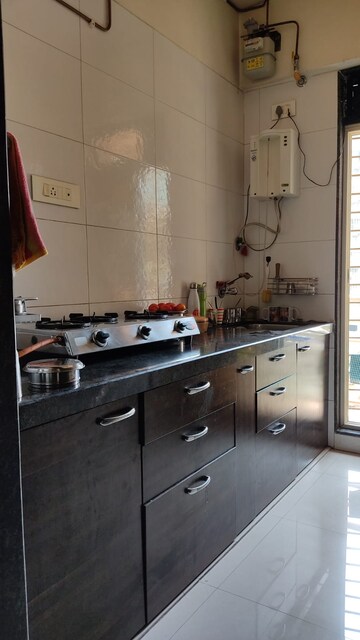 Kitchen in 2 BHK Apartment at Shivalaya Aniruddha Heights, Kamothe Sector 34 – for Sale