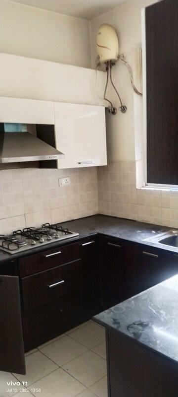 Kitchen in 3 BHK Builder Floor at Ansal API Esencia, Sector 67 – for Sale