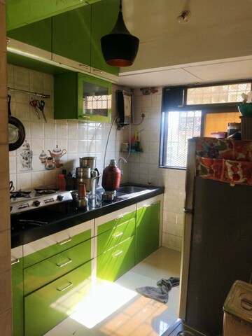 Kitchen in 2 BHK Apartment at Landmark CHS, Kamothe Sector 12 – for Sale