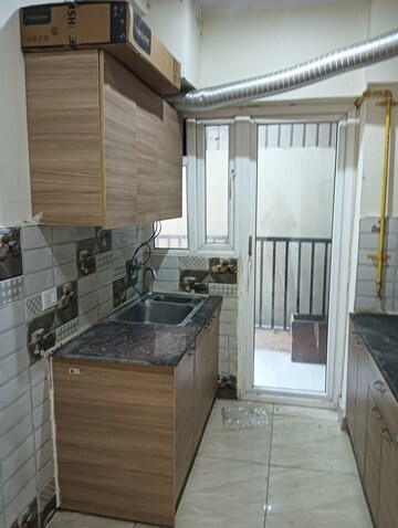 Kitchen in 2 BHK Apartment at Gaur Yamuna City, Gaur Yamuna City – for Rent