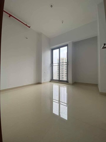 Bedroom in 2 BHK Apartment at Kalpataru The Sunrise, Kolshet Road – for Rent