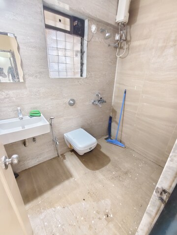 Bathroom in 2 BHK Apartment at Cosmos Jewels, Ghodbunder Road – for Rent