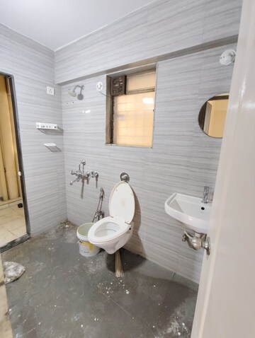 Bathroom in 2 BHK Apartment at Cosmos Jewels, Ghodbunder Road – for Rent