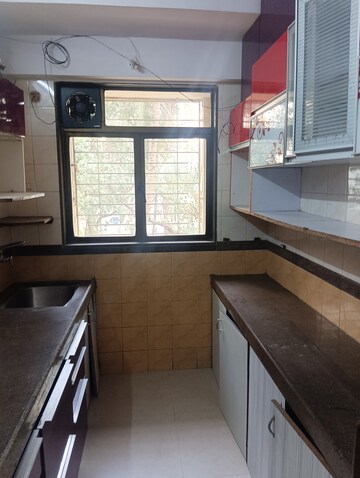 Kitchen in 2 BHK Apartment at Rustomjee Riviera, Malad West – for Rent