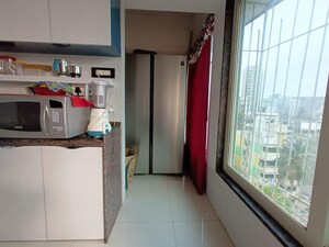Kitchen in 1 BHK Apartment at Gokul Garden CHS, Kandivali East – for Sale