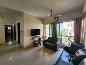 Living Room in 1 BHK Apartment at Gokul Garden CHS, Kandivali East – for Sale