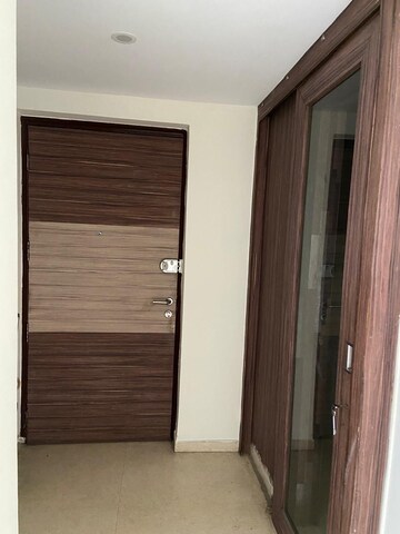 Building Lobby in 3.5 BHK Apartment at Unitech Escape, Sector 50 – for Rent