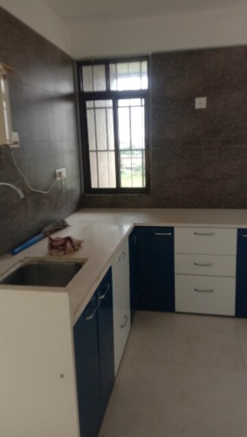 Kitchen in 2 BHK Apartment at Sonigara Presidency, Ravet – for Rent