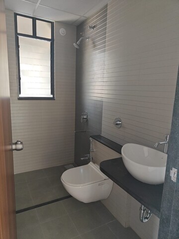Bathroom in 3 BHK Apartment at Mantra Mirari, Koregaon Park – for Sale