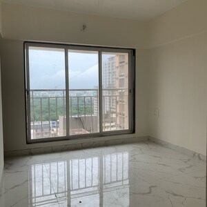 Room in 2 BHK Apartment at Kosmos Kedar Darshan, Kastur Park – for Sale