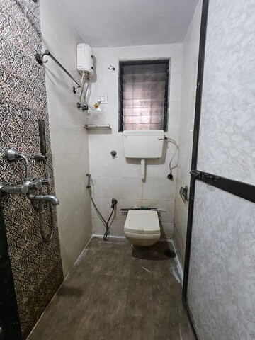 Bathroom in 1 BHK Apartment at Kopar Khairane – for Rent