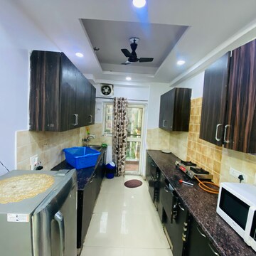 Kitchen in 2.5 BHK Apartment at Gardenia Golf City, Noida Central – for Rent
