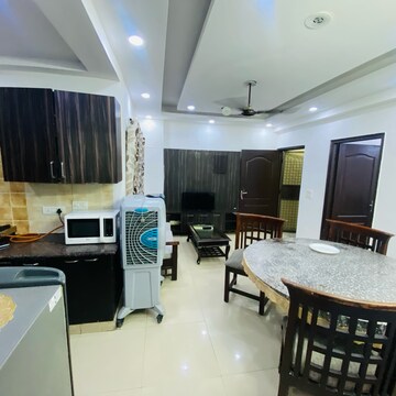 Living Room in 2.5 BHK Apartment at Gardenia Golf City, Noida Central – for Rent