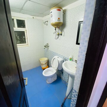 Bathroom in 2.5 BHK Apartment at Gardenia Golf City, Noida Central – for Rent