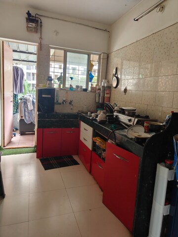 Kitchen in 2 BHK Apartment at Yash Sankul, Pimple Saudagar – for Sale