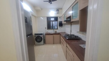 Kitchen in 2 BHK Apartment at Jasmine Tower, Vasant Vihar – for Rent