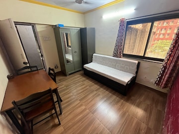 Living Room in 1 BHK Apartment at La Chapelle Apartment, Malad West – for Rent