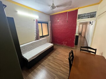 Living Room in 1 BHK Apartment at La Chapelle Apartment, Malad West – for Rent