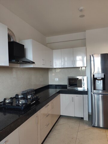 Kitchen in 5 BHK Apartment at Rishita Manhattan, Gomti Nagar – for Rent