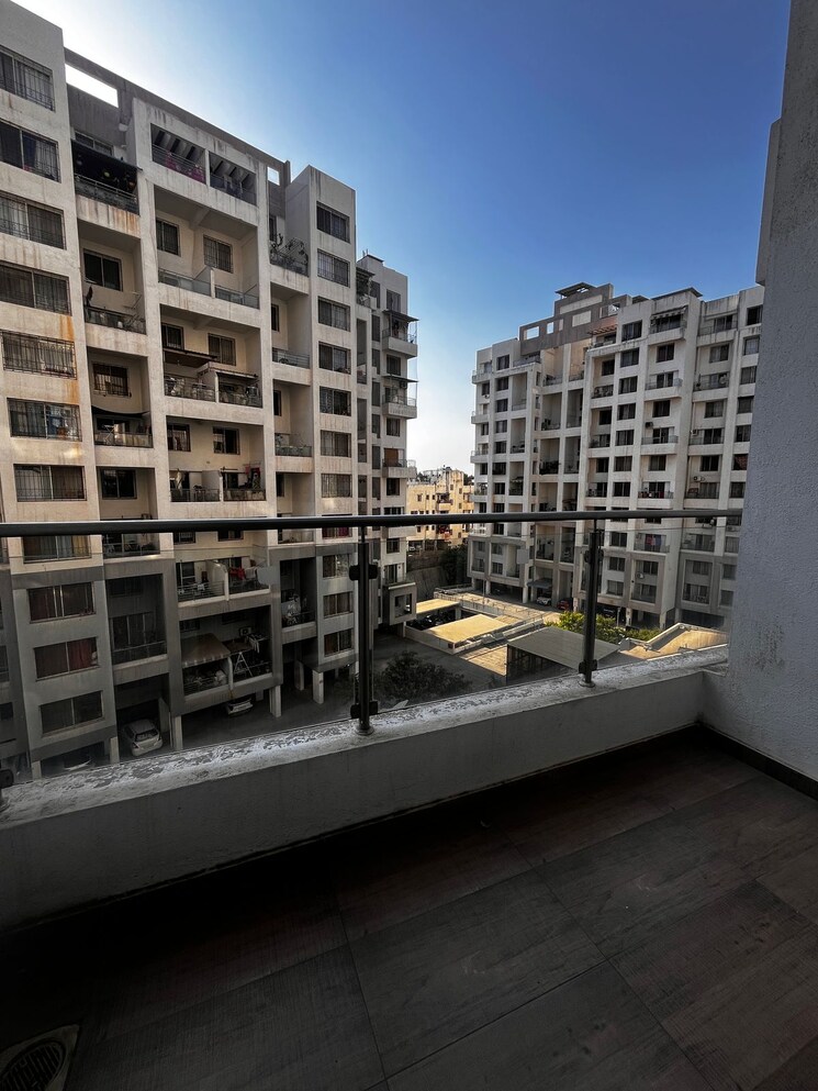 Balcony, kolte-patil-downtown-langston 2 Bedroom 900 Sq.Ft. Apartment In Kharadi Pune 9155539