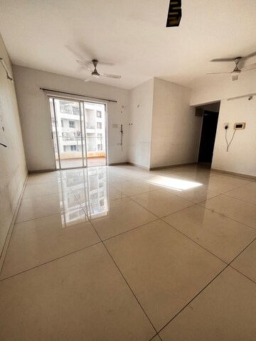 Living Room in 2 BHK Apartment at Kolte Patil Downtown Langston, Kharadi – for Rent