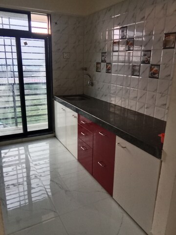 Kitchen in 2 BHK Apartment at Navkar City, Naigaon East – for Rent