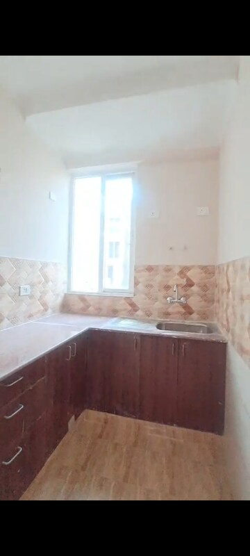 Kitchen in 3 BHK Apartment at Amrapali Golf Homes, Sector 4 Greater Noida – for Sale
