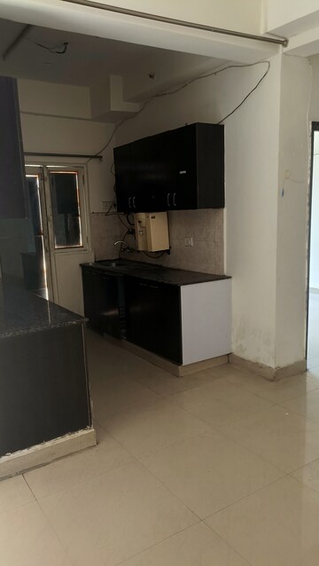 Kitchen in 3 BHK Apartment at Amrapali Silicon City, Sector 76 – for Rent