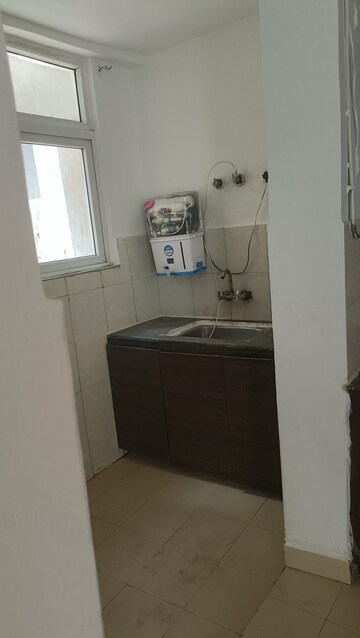 Kitchen in 3 BHK Apartment at Amrapali Silicon City, Sector 76 – for Rent
