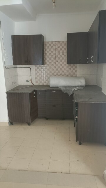 Kitchen in 3 BHK Apartment at Amrapali Silicon City, Sector 76 – for Rent
