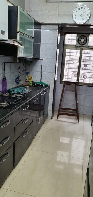 Kitchen in 2.5 BHK Apartment at Prakruti Pearl, Ghodbunder Road – for Rent