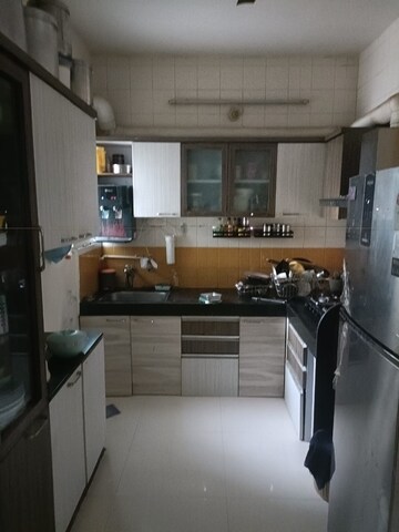 Kitchen in 2 BHK Apartment at Surobhi Regency, Ghorpadi – for Sale