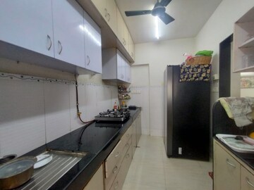 Kitchen in 3 BHK Apartment at Cosmic Heights, Bhakti Park – for Rent