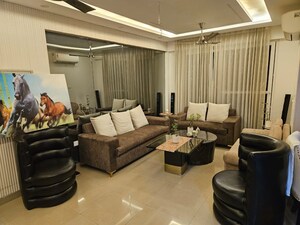 Living Room in 4 BHK Apartment at The New Greenwood, Sector 52 – for Sale