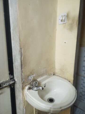 Bathroom in 1 RK Apartment at Angolimala CHS, Kurla East – for Rent