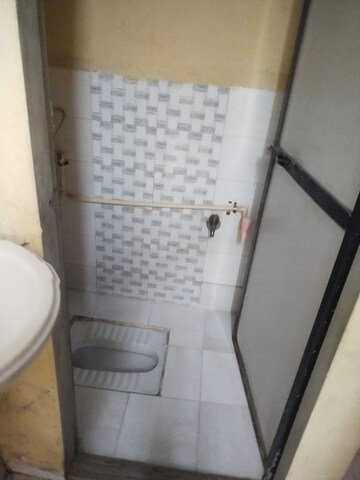 Bathroom in 1 RK Apartment at Angolimala CHS, Kurla East – for Rent