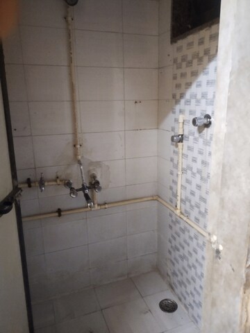 Bathroom in 1 RK Apartment at Angolimala CHS, Kurla East – for Rent