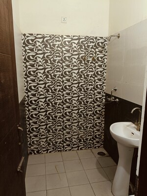 Bathroom in 2 BHK Builder Floor at Shri Devaji Residency, Dhakoli – for Sale