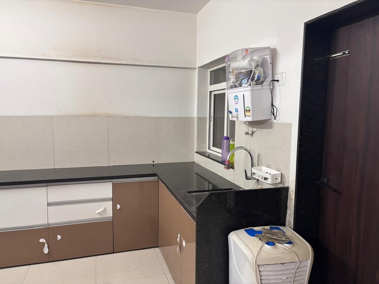 Kitchen, puraniks-abitante-fiore 2 Bedroom 908 Sq.Ft. Apartment In Bavdhan Pune 9156119