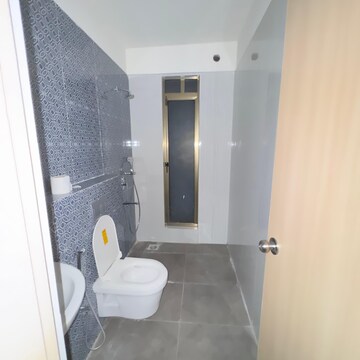 Bathroom in 4 BHK Apartment at Raj Infinia, Evershine Nagar – for Sale