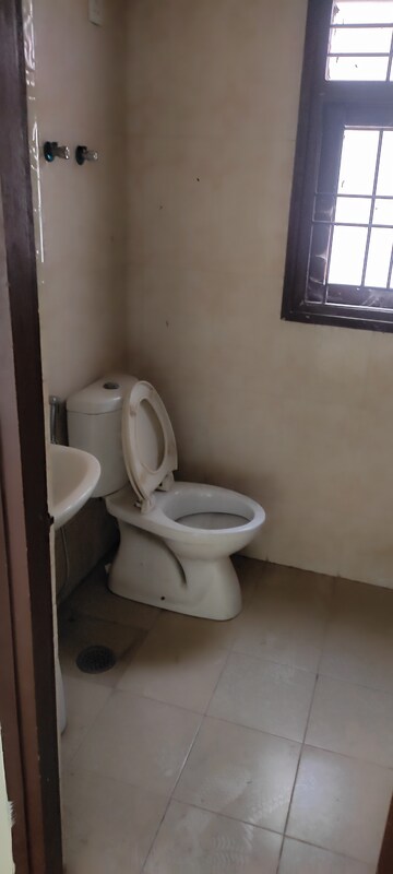 Bathroom in 2.5 BHK Builder Floor at Kingwood Enclave, Wave City – for Sale