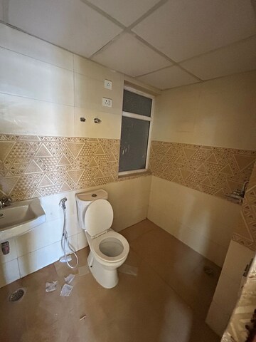 Bathroom in 3 BHK Apartment at Nirala Estate, Tech Zone 4 Greater Noida – for Rent