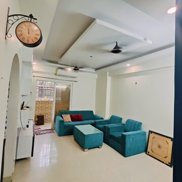 Living Room in 2 BHK Apartment at Aims Golf City, Sector 75 – for Rent