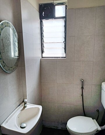 Bathroom in 2 BHK Apartment at 9 Krushna Kunj, Wagholi – for Rent