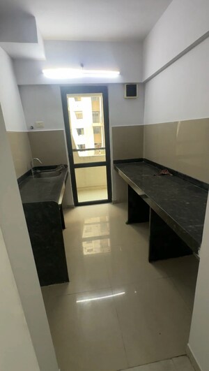 Kitchen in 1 BHK Apartment at Lodha Palava City Lakeshore Greens, Dombivli East – for Sale