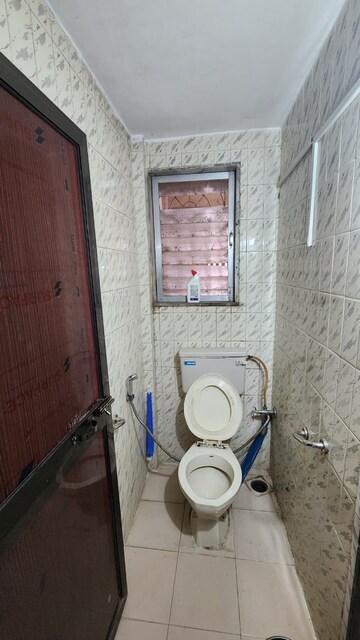 Bathroom in 1 BHK Apartment at Kapol CHS, Mahavir Nagar – for Rent