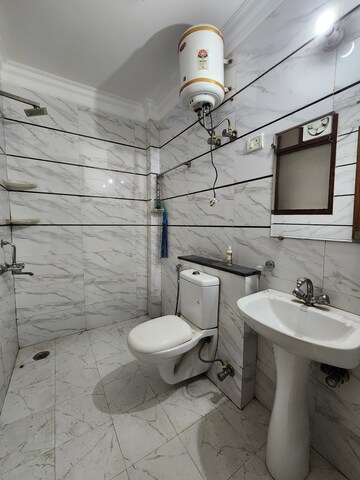 Bathroom in 3 BHK Builder Floor at Chattarpur – for Rent