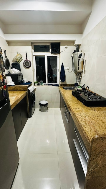Kitchen in 1 BHK Apartment at Crescent Landmark, Andheri East – for Rent
